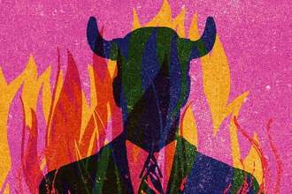 silhouette of a man in a suit with horns standing in flames
