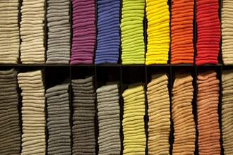 socks perfectly stacked by color