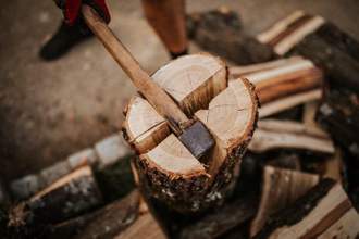 splitting firewood into four
