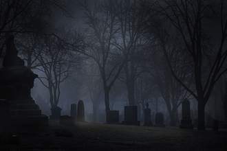 spooky cemetery at night