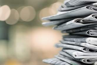 stack of newspapers