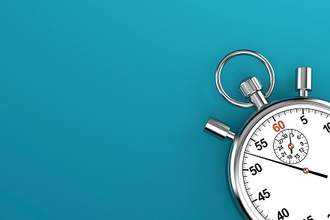 stopwatch on light blue green background
