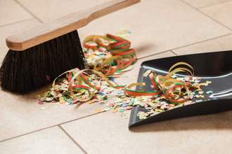sweeping confetti after a party