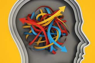 tangled paper with arrows pointing different ways inside a human head shape