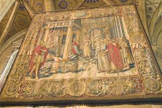 tapestry hanging in a cathedral