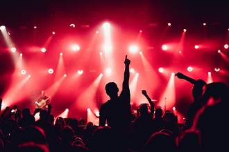 the front of a busy crowd at a concert