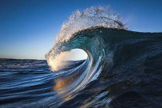 the perfect ocean wave cresting