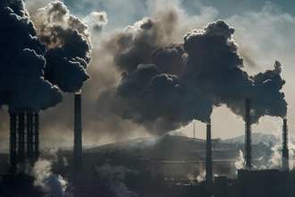 the smog filled skies over a factory