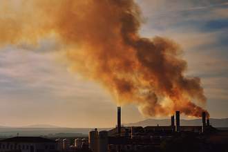 thick smoke coming from factory