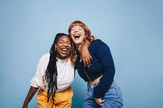 two friends laughing together