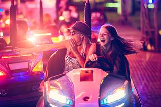 two women in bumper car
