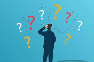 unsure businessman thinking and doubting with question marks