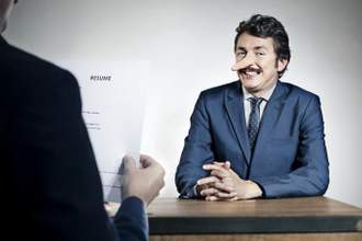 view of a man with an growing nose showing that he lied on his resume