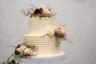 view of wedding cake with floral details