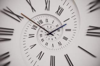 white spiral clock dial