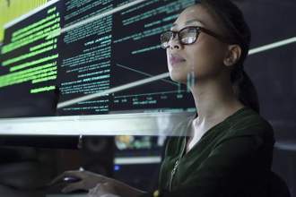 woman looking at her computer searching for information