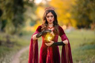 woman practicing magic in the forest