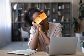 woman with post it notes over her eyes