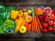 a colorful rainbow of mostly summer vegetables