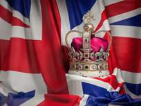 royal golden crown with jewels on british flag